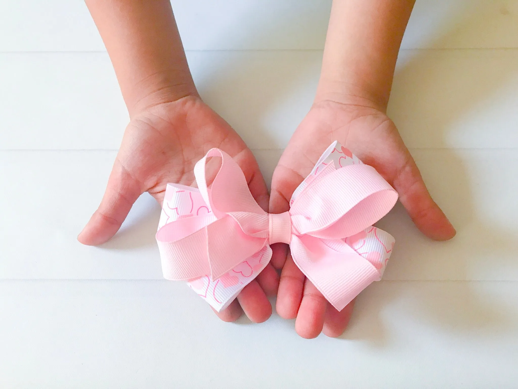 Girls Double Twisted Valentine  Pink Heart Boutique Hair Bow I The Enchanted Magnolia