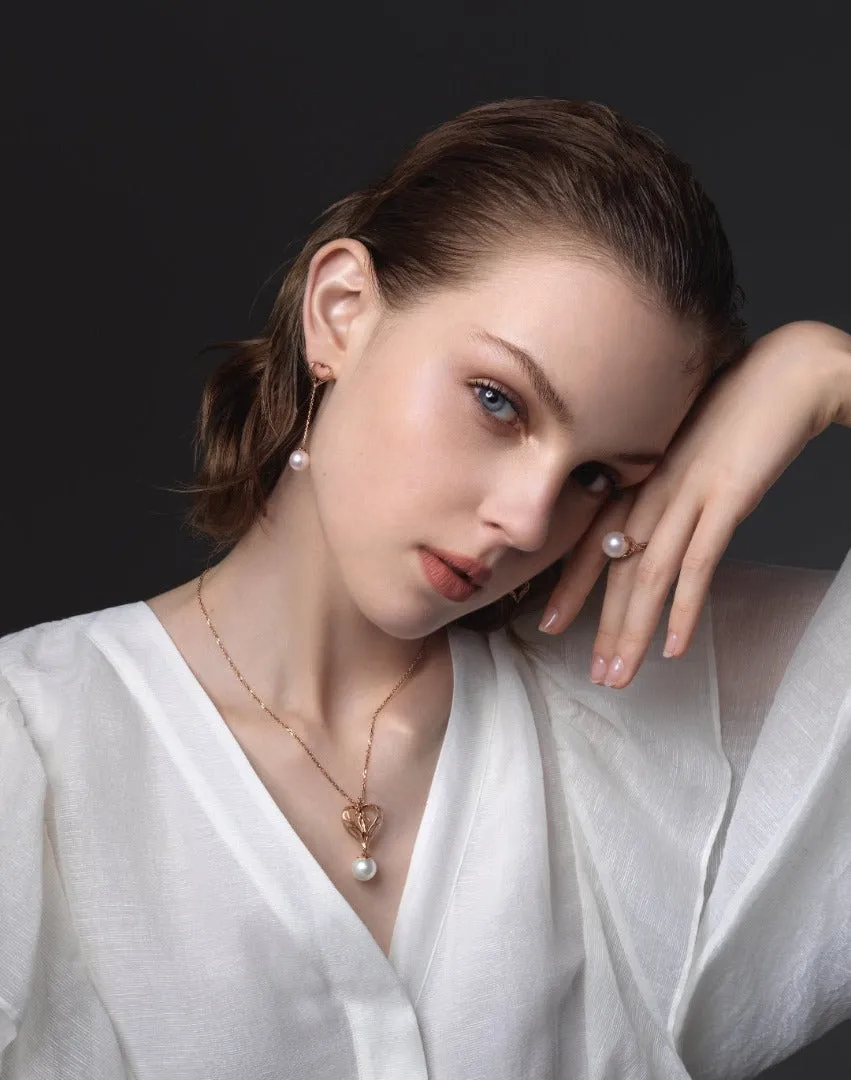 THIALH - DATURA • ASTRA - 18K Rose Gold Ruby and Fresh Water Pearl Duality Earrings